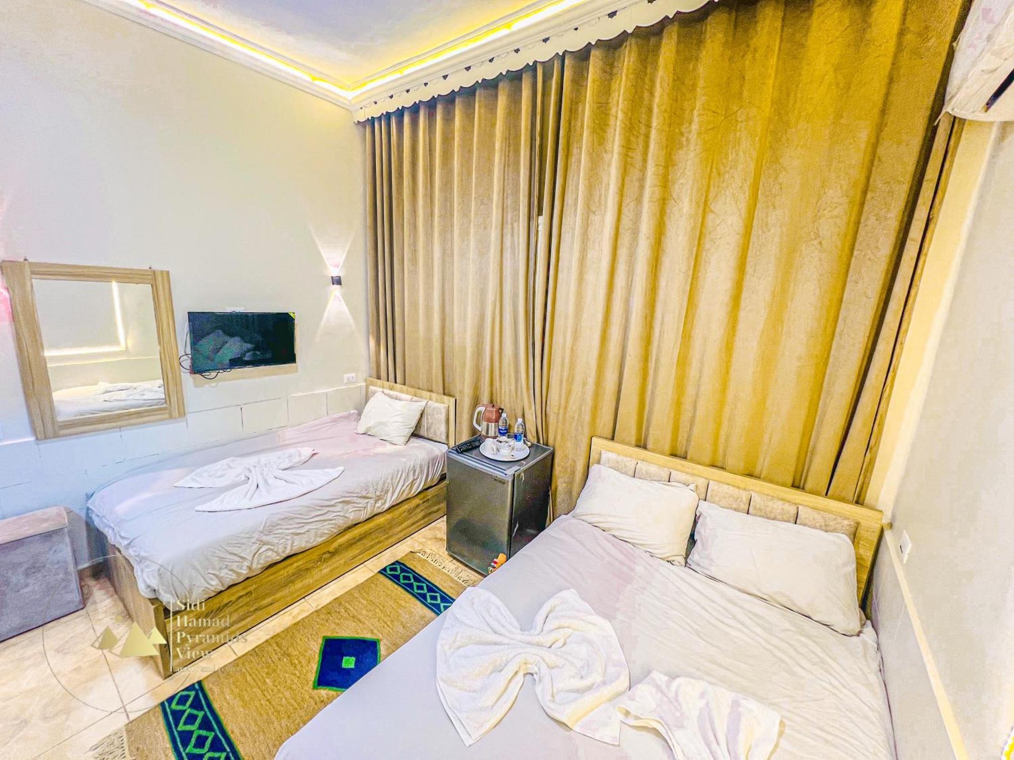 Sidi Hamad Pyramids View Hotel Kafret el-Gabal Kültér fotó